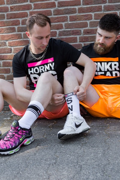 Sk8erboy® short de sport orange fluo