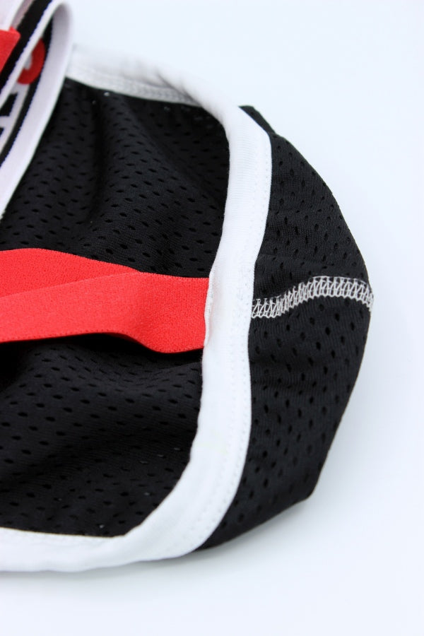 jockstrap sk8erboy en noir, blanc et rouge, avec tissu mesh à l’avant et grand logo sur la large ceinture, en lingerie fétiche, vue détaillée de la poche