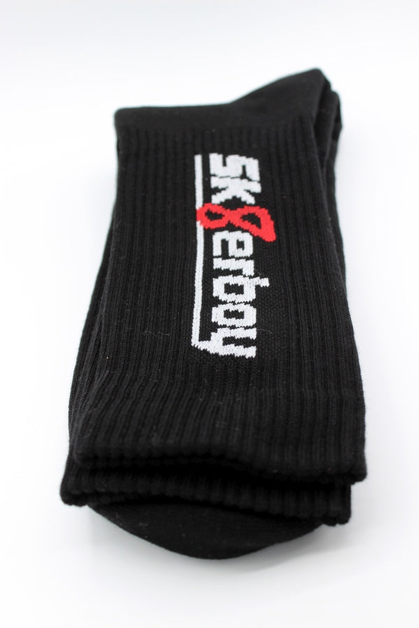 sk8erboy crew socks in black with white sk8erboy lettering and a red 8 on the cuff